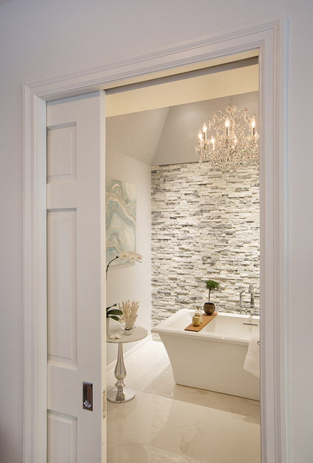 This newly designed primary bath is located on the first floor of the home to make it accessible for many years to come.