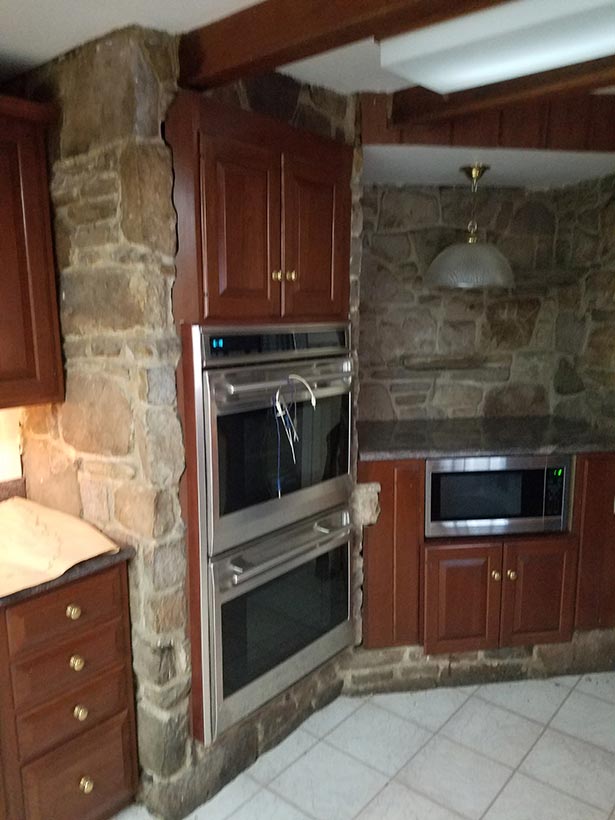 Before: Wentzel divvied up the previous kitchen space between the new laundry room and butler’s
                pantry.