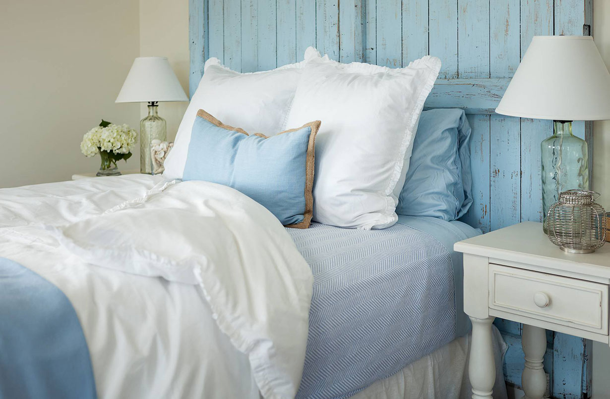 Summer Cooldowns for Steamy Bedrooms: Choose lightweight bedding.