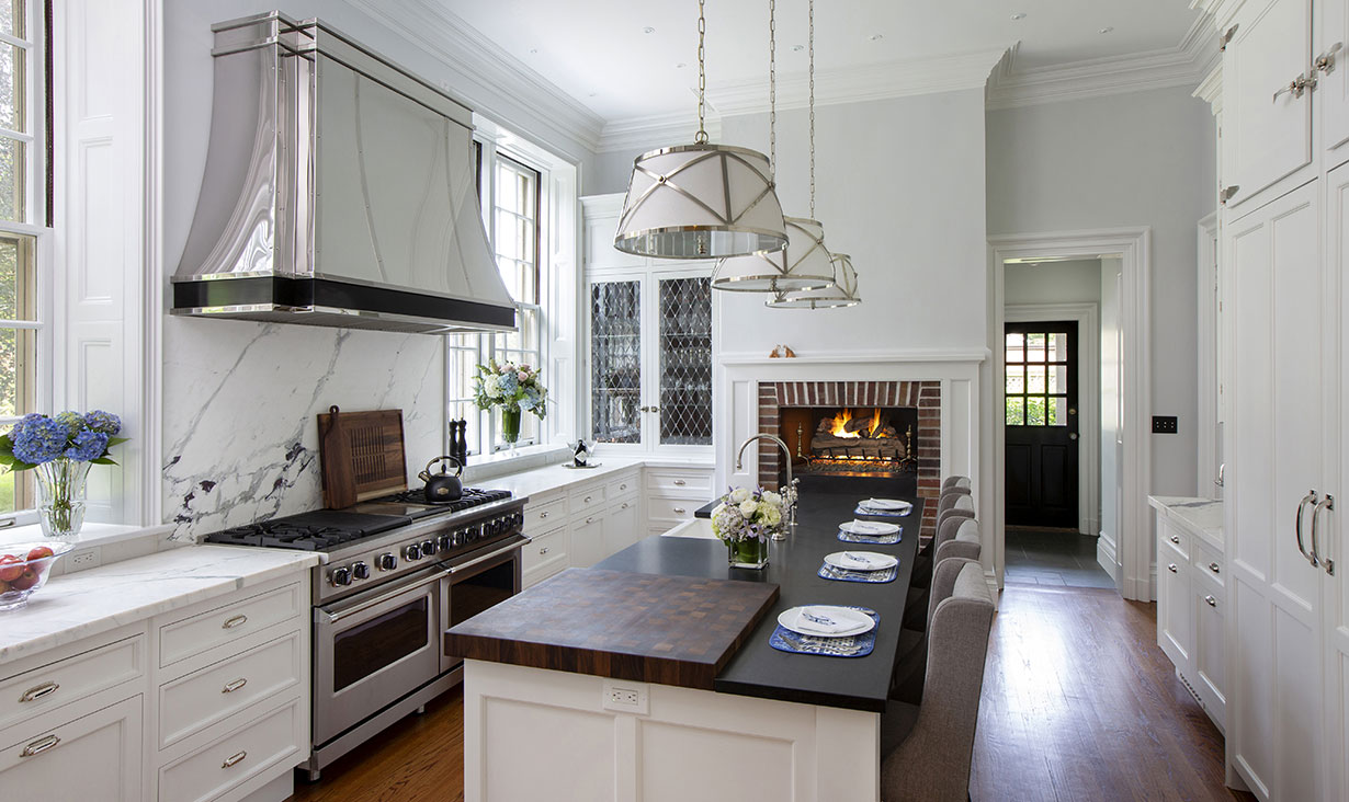 We worked with cabinetry designer Christopher Peacock and the homeowner to design a new main kitchen.