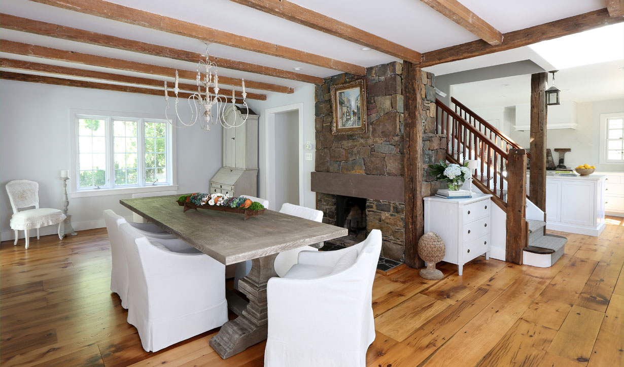 Kitchen with exposed beams designed by building company Lasley Brahaney Architecture + Construction in Princeton, NJ