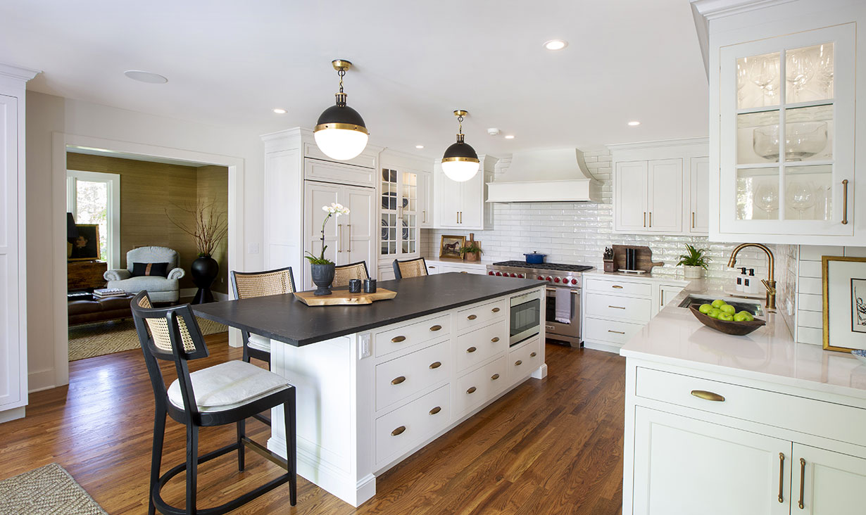 Our Princeton architects designed this large, inviting kitchen. The Carbo Brushed Quartz countertop has the appearance of soapstone and contrasts nicely with the white elements.