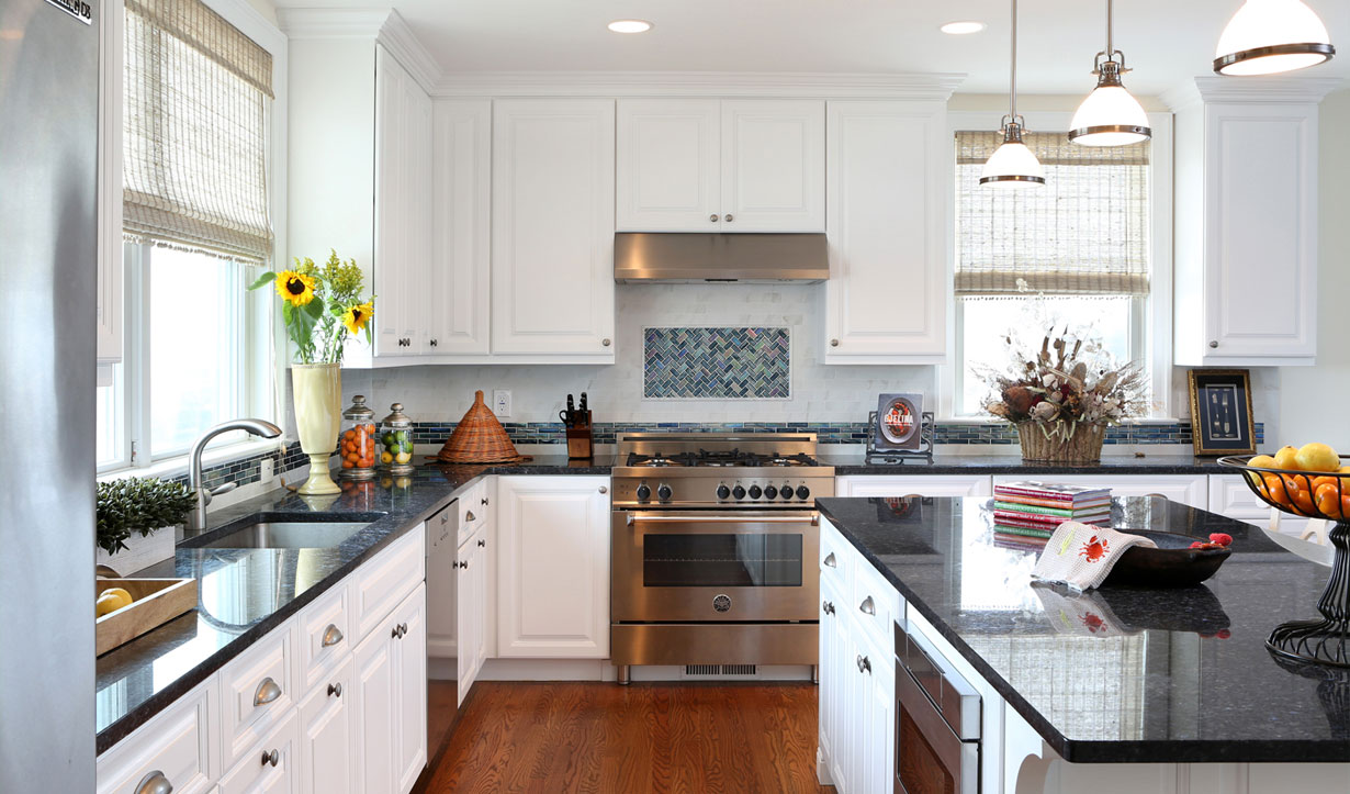 White and stainless steel kitchen design by construction company Lasley Brahaney Architecture + Construction in Princeton, NJ