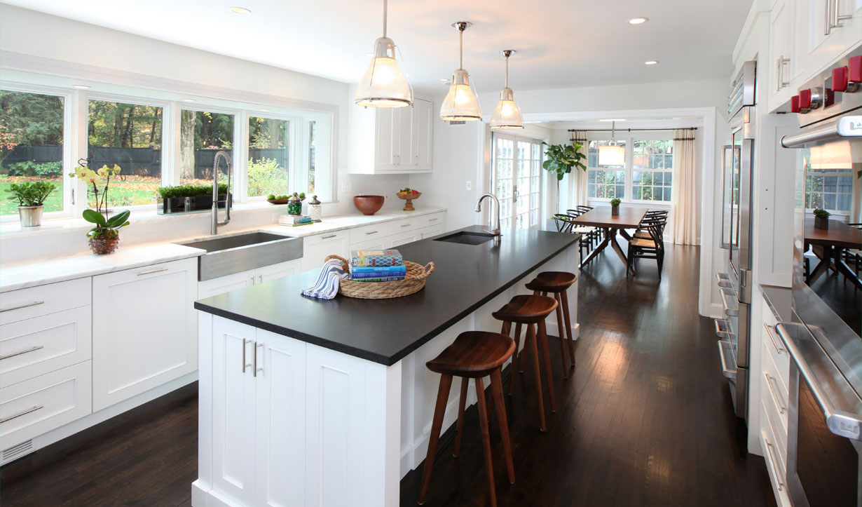 A white kitchen designed by construction company Lasley Brahaney Architecture + Construction in Princeton, NJ