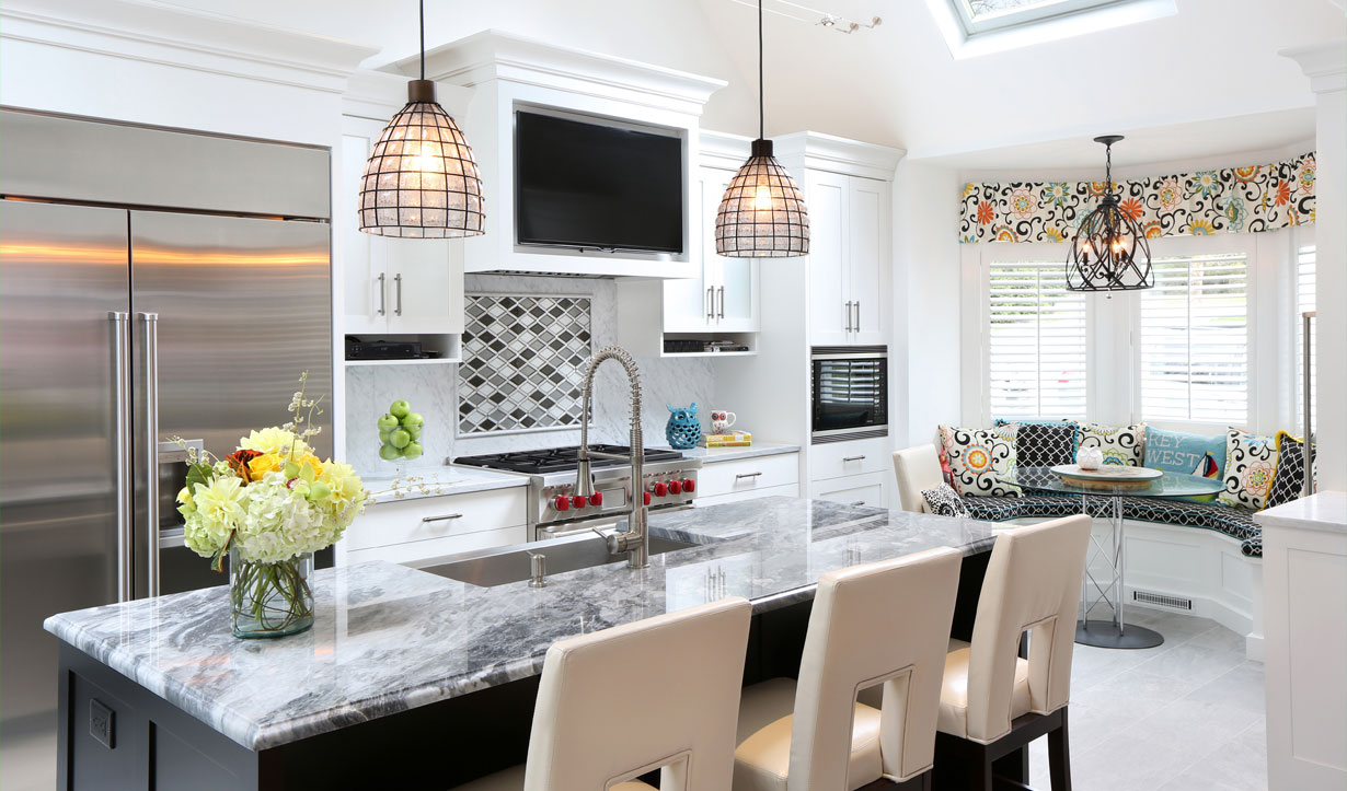 Marble and black kitchen renovation by construction company Lasley Brahaney Architecture + Construction in Princeton, NJ